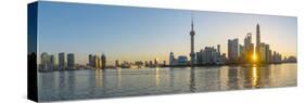 China, Shanghai, Pudong District, Skyline of the Financial District across Huangpu River at Sunrise-Alan Copson-Stretched Canvas