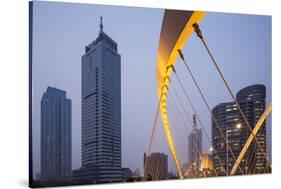 China, Tianjin, Dagu Bridge with Skyscrapers Rising Along Haihe River-Paul Souders-Stretched Canvas