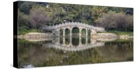 Chinese Bridge over Green Lake in Kunming, China-Darrell Gulin-Stretched Canvas