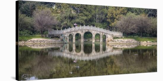 Chinese Bridge over Green Lake in Kunming, China-Darrell Gulin-Stretched Canvas