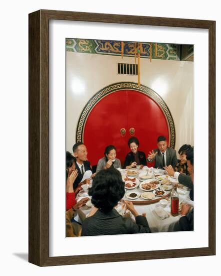 Chinese Family During Dinner at a Traditonally Decorated Restaurant-null-Framed Photographic Print