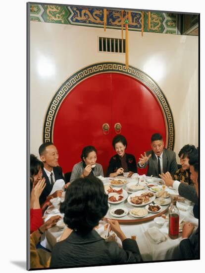 Chinese Family During Dinner at a Traditonally Decorated Restaurant-null-Mounted Photographic Print
