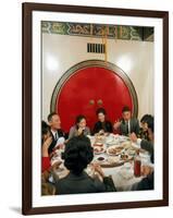 Chinese Family During Dinner at a Traditonally Decorated Restaurant-null-Framed Photographic Print