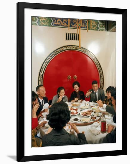 Chinese Family During Dinner at a Traditonally Decorated Restaurant-null-Framed Photographic Print