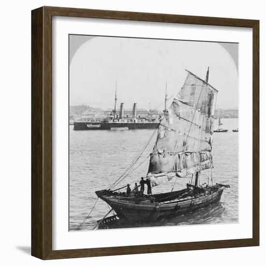 Chinese junk and British battleship in the harbour at Hong Kong, 1902-Carlton Harlow Graves-Framed Photographic Print