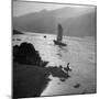 Chinese Junk Boat Sailing Past a Spear Fisherman on the Shore of the Yangtze River-Dmitri Kessel-Mounted Photographic Print