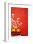 Chinese New Year Decoration--A Basket of Oranges with Plum Flower on a Festive Background.-Liang Zhang-Framed Photographic Print