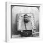 Chinese Prisoner in the Cangue Placarded with the Record of His Crime, China, 1902-CH Graves-Framed Photographic Print