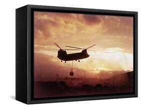 Chinook Helicopter Lifts Ammunition-null-Framed Stretched Canvas