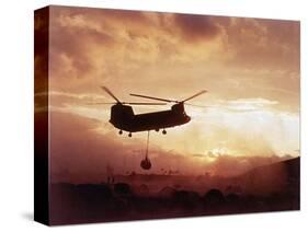 Chinook Helicopter Lifts Ammunition-null-Stretched Canvas