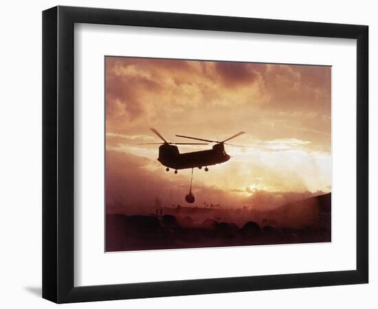 Chinook Helicopter Lifts Ammunition-null-Framed Photographic Print