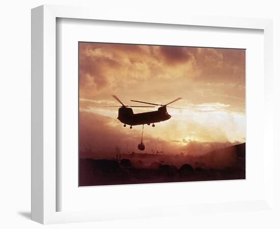 Chinook Helicopter Lifts Ammunition-null-Framed Photographic Print
