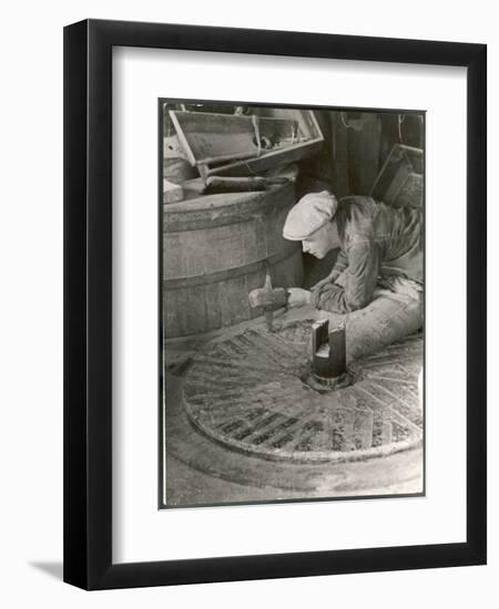 Chipping out the Cutting Edges (Dressing) a Millstone at the Old Flour Mill at Ewell Surrey-null-Framed Art Print