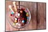 Chocolate Ice Cream with Multicolor Candies and Wafer Rolls in Glass Bowl, on Wooden Background-Yastremska-Mounted Photographic Print