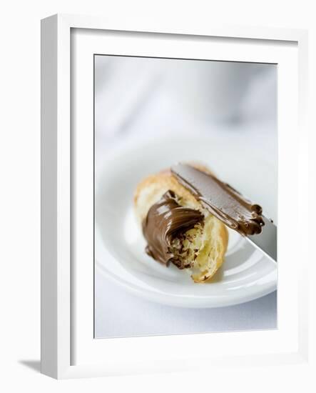 Chocolate Spread on a Croissant with a Knife-Ira Leoni-Framed Photographic Print