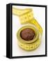 Chocolate Truffle Lying in Rolled-Up Tape Measure-Elisabeth Cölfen-Framed Stretched Canvas