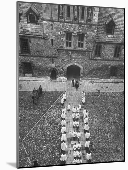 Choir Filing Down Center of Chamber Court at Winchester College-Cornell Capa-Mounted Photographic Print