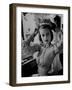 Chorus Girl Hope Chandler Securing Her Feathered Headdress as She Sits at Makeup Table-Peter Stackpole-Framed Photographic Print