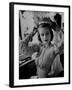 Chorus Girl Hope Chandler Securing Her Feathered Headdress as She Sits at Makeup Table-Peter Stackpole-Framed Photographic Print