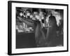 Chorus Girl-Singer Linda Lombard, Resting Her Legs after a Tough Night on Stage-George Silk-Framed Photographic Print