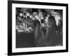 Chorus Girl-Singer Linda Lombard, Resting Her Legs after a Tough Night on Stage-George Silk-Framed Photographic Print