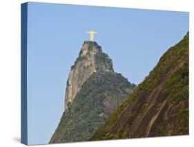 Christ the Redeemer statue on top of the Corcovado Mountain viewed from Santa Marta, Rio de Janeiro-Karol Kozlowski-Stretched Canvas