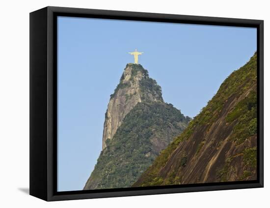Christ the Redeemer statue on top of the Corcovado Mountain viewed from Santa Marta, Rio de Janeiro-Karol Kozlowski-Framed Stretched Canvas