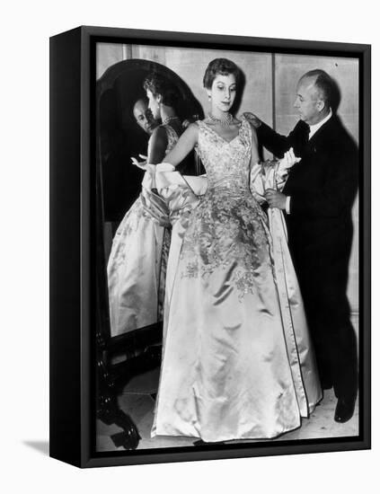 Christian Dior Arranging One of His Dresses-null-Framed Stretched Canvas