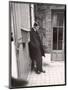 Christian Dior's Successor Yves Saint Laurent Standing Alone After Attending Dior's Funeral-Loomis Dean-Mounted Premium Photographic Print