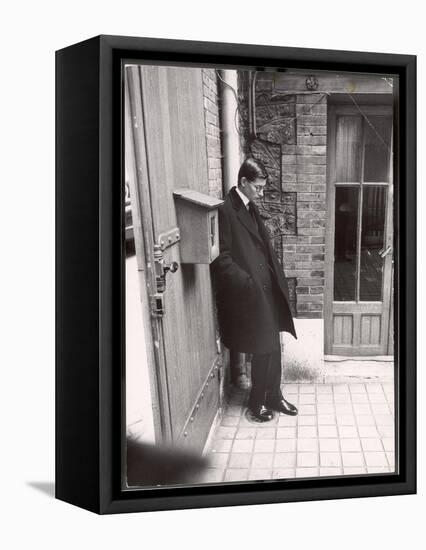 Christian Dior's Successor Yves Saint Laurent Standing Alone After Attending Dior's Funeral-Loomis Dean-Framed Stretched Canvas