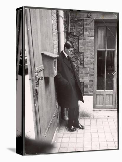 Christian Dior's Successor Yves Saint Laurent Standing Alone After Attending Dior's Funeral-Loomis Dean-Stretched Canvas