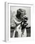 Christina Goldsmith Kissing a Weimaraner Puppy from Her Father's Stock of Weimaraner Hunting Dogs-Bernard Hoffman-Framed Photographic Print