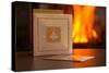 Christmas cards, fireplace with fire on background-Paivi Vikstrom-Stretched Canvas