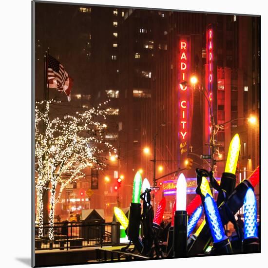 Christmas Decorations in front of the Radio City Music Hall in the Snow on a Winter Night-Philippe Hugonnard-Mounted Photographic Print