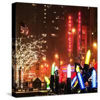 Christmas Decorations in front of the Radio City Music Hall in the Snow on a Winter Night-Philippe Hugonnard-Stretched Canvas