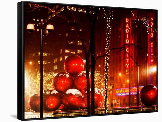 Christmas Decorations in front of the Radio City Music Hall in the Snow-Philippe Hugonnard-Framed Stretched Canvas