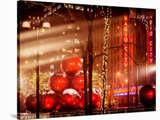 Christmas Decorations in front of the Radio City Music Hall in the Snow-Philippe Hugonnard-Stretched Canvas