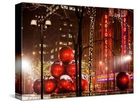 Christmas Decorations in front of the Radio City Music Hall in the Snow-Philippe Hugonnard-Stretched Canvas