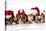 Christmas Dog - Cute Christmas Concept with One Naughty Dog in a Bunch of Santa's-Willee Cole-Stretched Canvas