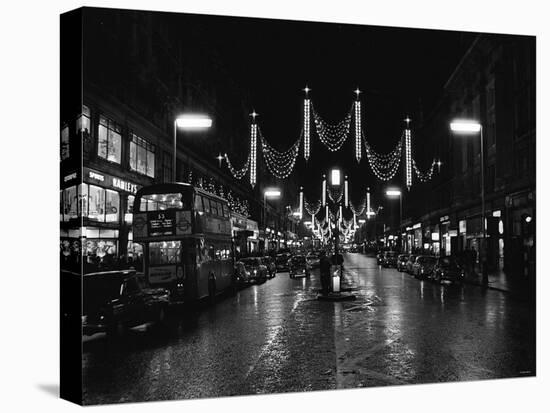 Christmas Lights and Decorations in Regent Street, London 1966-null-Stretched Canvas