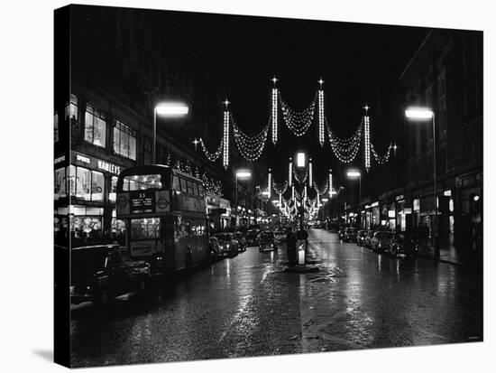 Christmas Lights and Decorations in Regent Street, London 1966-null-Stretched Canvas