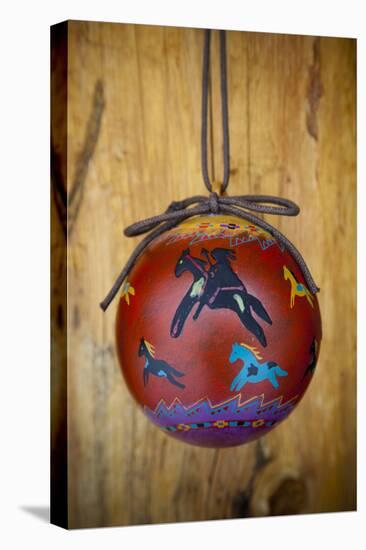 Christmas ornament of a painted ball with colorful Native American horses-Angel Wynn-Stretched Canvas