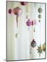 Christmas Ornaments Hanging from Strings-Ryan Mcvay-Mounted Photographic Print