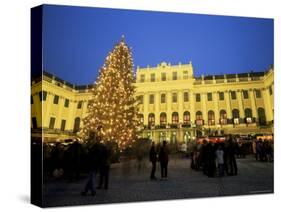 Christmas Tree in Front of Schonbrunn Palace at Dusk, Unesco World Heritage Site, Vienna, Austria-Jean Brooks-Stretched Canvas