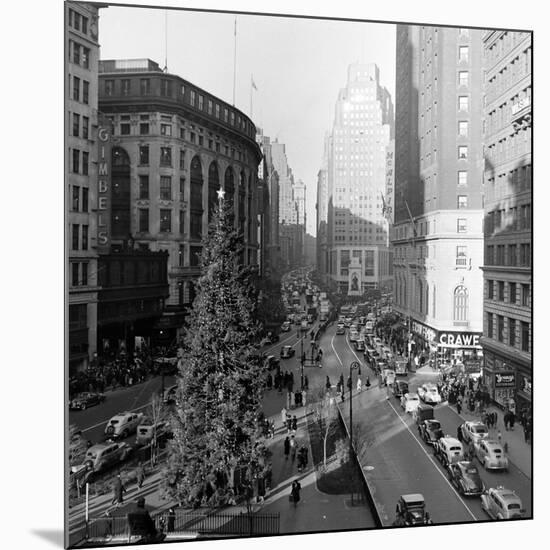 Christmas Tree on 52nd Street Next to Gimbels Department Store, New York, NY, 1940S-Nina Leen-Mounted Photographic Print