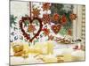 Christmassy Window Decorated with Biscuits and Candles-Linda Burgess-Mounted Photographic Print