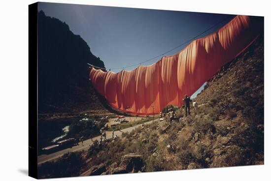 Christo's 400 Meter Six-Ton Orange Curtain across Rifle Gap in Colorado, Aug. 1972-null-Stretched Canvas