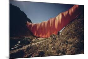 Christo's 400 Meter Six-Ton Orange Curtain across Rifle Gap in Colorado, Aug. 1972-null-Mounted Photo