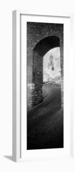 Church Viewed Through an Archway, Puerta Del Sol, Medina Sidonia, Cadiz, Andalusia, Spain-null-Framed Photographic Print