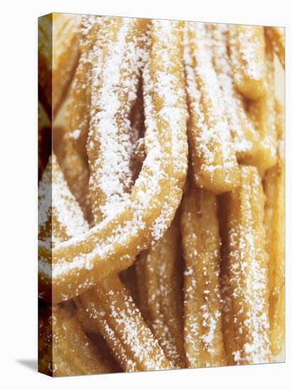 Churros (Spanish Fried Pastry Snack)-null-Stretched Canvas
